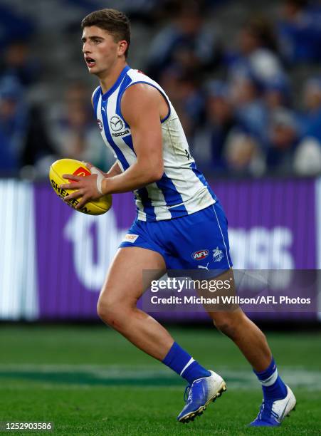 Harry Sheezel of the Kangaroos in action during the 2023 AFL Round 08 match between the North Melbourne Kangaroos and the St Kilda Saints at Marvel...