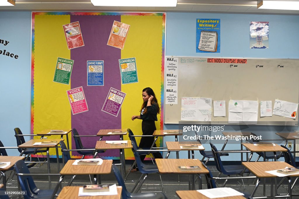 Rose Jean Obreque looks over her empty classroom at Fox Creek Junior