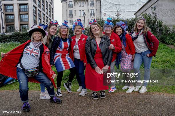 Tracy George and her friends from Wiltshire in the South West of England can be seen in Green Park in London on the day of the Coronation of King...