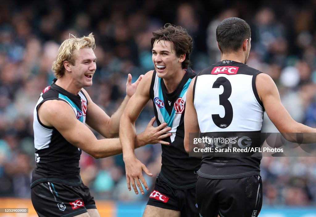 Connor Rozee Captain Connor Rozee of the Power celebrates a goal with Jason Horne-Francis ...