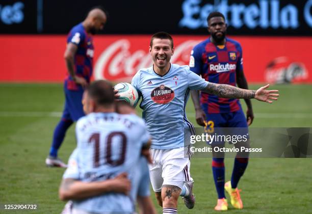 Fedor Smolov of RC Celta Vigo celebrates scoring his sides first goal during the Liga match between RC Celta de Vigo and FC Barcelona at...