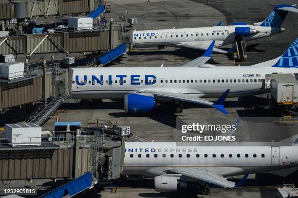 United Airlines aircrafts are parked at Newark Liberty International Airport in Newark, New Jersey, on March 9, 2023. - Airlines and unions disagree...