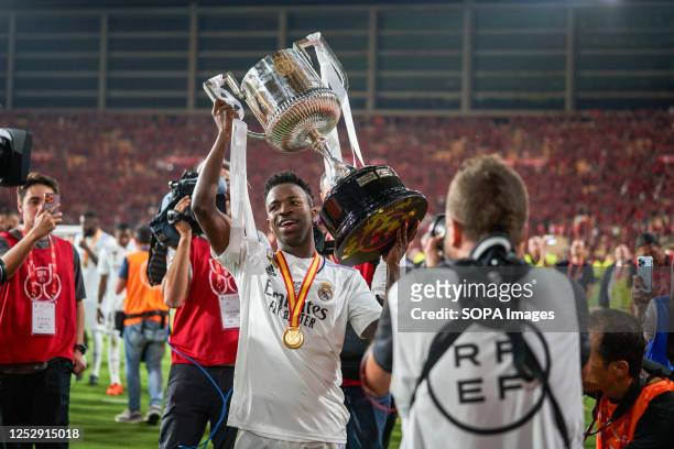 Vinicius Paixao de Oliveira junior of Real Madrid CF holds the trophy during the Copa del Rey final between Real Madrid CF and CA Osasuna at La...