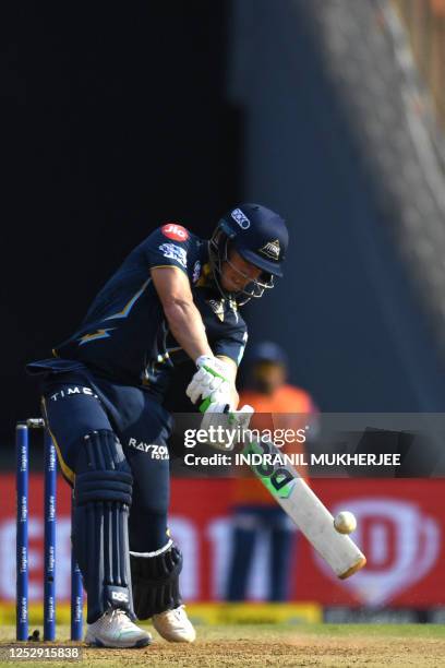 Gujarat Titans' David Miller plays a shot during the Indian Premier League Twenty20 cricket match between Gujarat Titans and Lucknow Super Giants at...