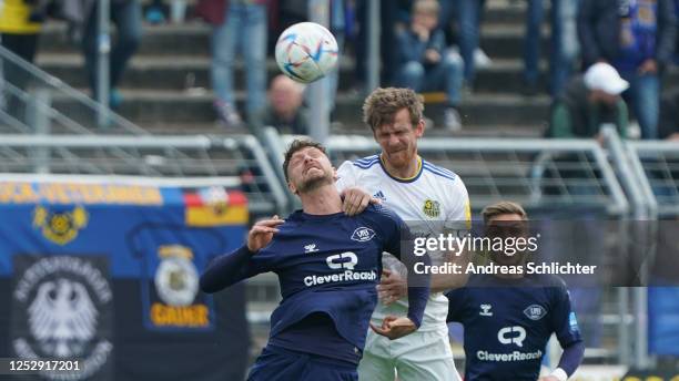 May 7: Manuel Zeitz of FC Saarbruecken challenges Patrick Haenhuettl of VFB Oldenburg during the 3. Liga match between VfB Oldenburg and 1. FC...