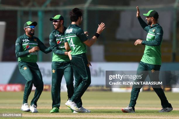 Pakistan's players celebrate after the dismissal of New Zealand's Tom Blundell during the fifth and final one-day international cricket match between...