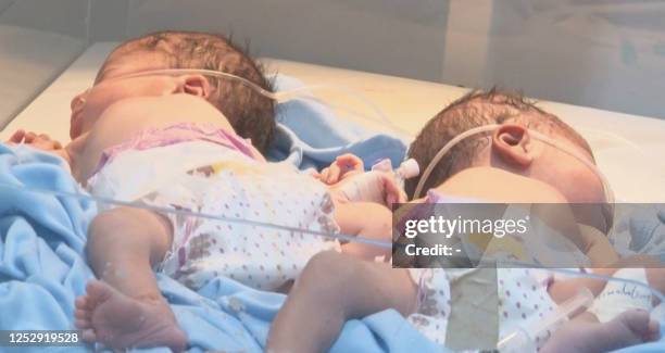 This image grab taken from AFPTV video footage shot on May 4 shows infants at a maternity hospital in Omdurman, the Sudanese captial's twin city....