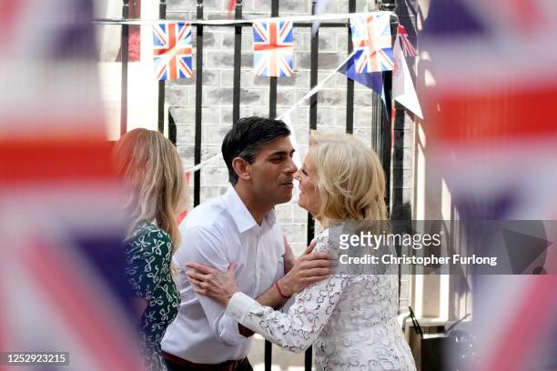 First Lady of the United States of America, Dr. Jill Biden, and granddaughter Finnegan Biden greet Prime Minister Rishi Sunak during a lunch at...