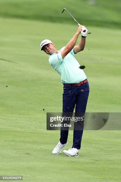 Patton Kizzire of the United States plays a shot on the 18th hole during the third round of the Travelers Championship at TPC River Highlands on June...