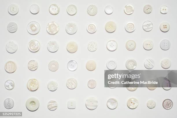 collection of white buttons - catherine macbride stock pictures, royalty-free photos & images
