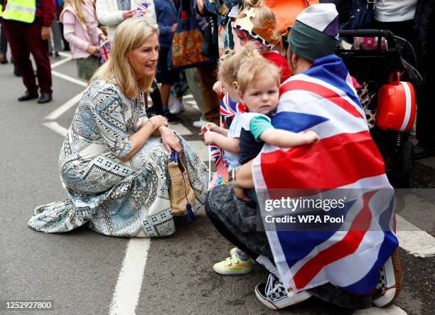 Britain's Sophie, Duchess of Edinburgh greets people as she arrives to attend a Big Lunch with residents and representatives from the Royal British...