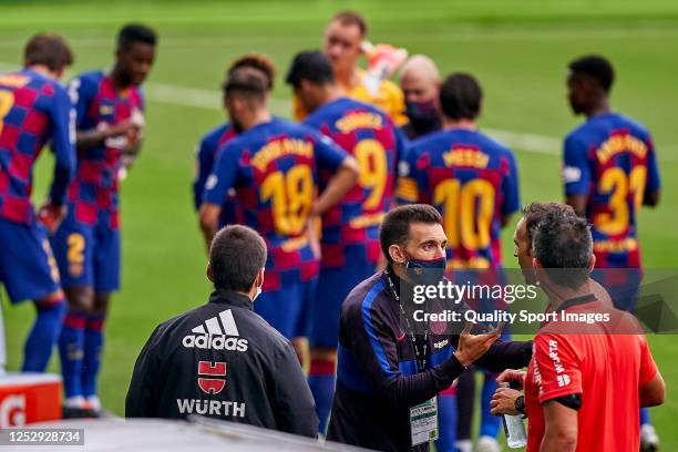 Eder Sarabia the second manager of FC Barcelona talks with referee Guillermo Cuadra Fernandez during the Liga match between RC Celta de Vigo and FC...