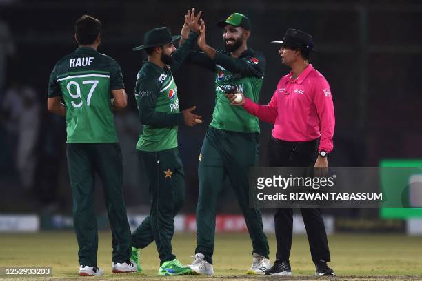 Pakistan's players celebrate the dismissal of New Zealand's Ish Sodhi during the fifth and final one-day international cricket match between Pakistan...