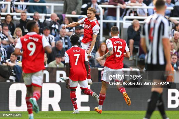 Martin Odegaard of Arsenal celebrates after scoring a goal to make it 0-1 during the Premier League match between Newcastle United and Arsenal FC at...