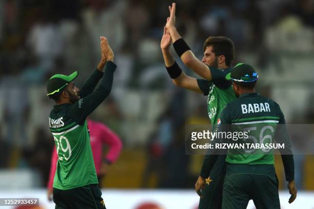Pakistan's Shaheen Shah Afridi celebrates the dismissal of New Zealand's Cole McConchie during the fifth and final one-day international cricket...