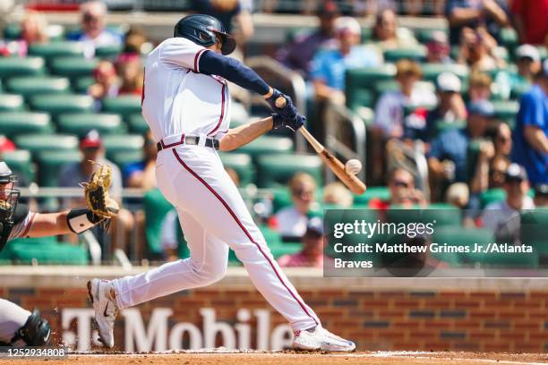 Matt Olson of the Atlanta Braves hits a home run during the first inning between the Atlanta Braves the Baltimore Orioles at Truist Park on May 7,...