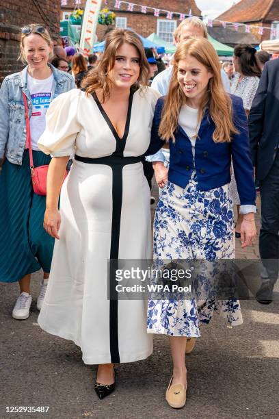 Princess Beatrice of York and Princess Eugenie of York attend a Coronation Big Lunch in Chalfont St Giles, Buckinghamshire on May 7, 2023 in Chalfont...