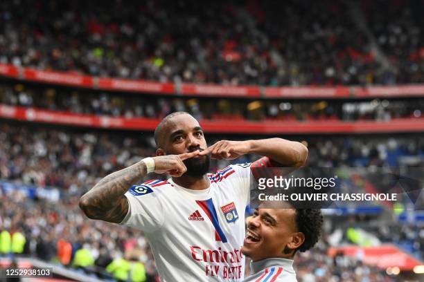 Lyon's French forward Alexandre Lacazette celebrates scoring his team's fifth goal during the French L1 football match between Olympique Lyonnais and...