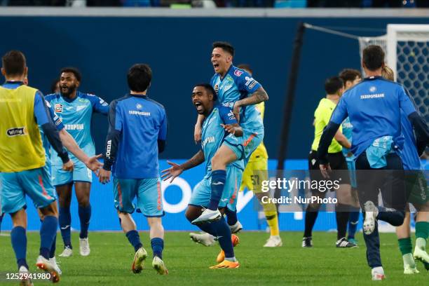 Malcom and Gustavo Mantuan of Zenit St. Petersburg celebrate victory during the Russian Premier League match between FC Zenit Saint Petersburg and FC...