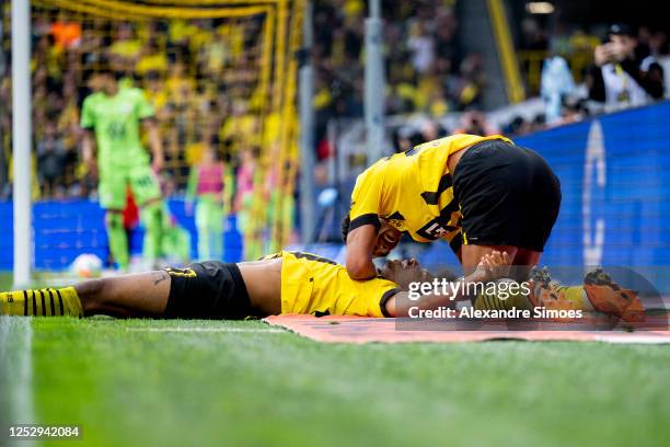 Jude Bellingham and Karim Adeyemi of Borussia Dortmund are celebrating a goal during the Bundesliga match between Borussia Dortmund and VfL Wolfsburg...