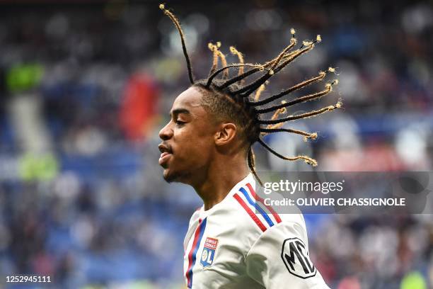 Lyon's French forward Bradley Barcola reacts during the French L1 football match between Olympique Lyonnais and Montpellier Herault SC at The...