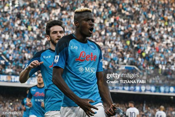 Napoli's Nigerian forward Victor Osimhen celebrates after scoring a penalty to open the scoring during the Italian Serie A football match between SSC...