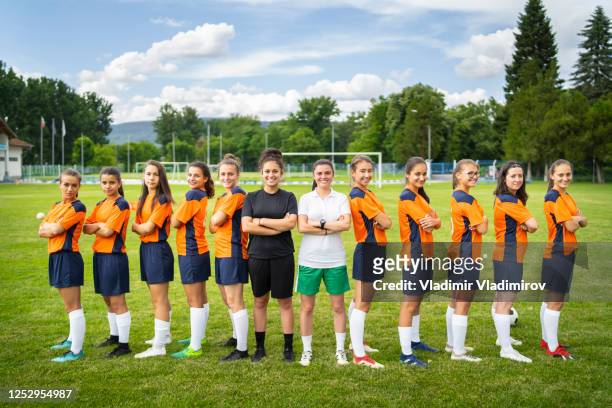 portrait of a female soccer team - soccer team stock pictures, royalty-free photos & images