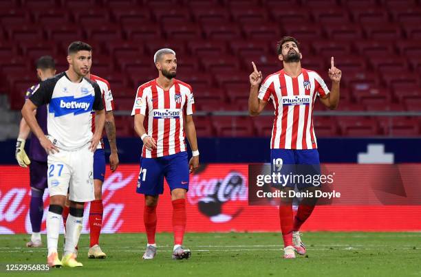 Diego Costa of Atletico Madrid celebrates after scoring his team's second goal during the La Liga match between Club Atletico de Madrid and Deportivo...