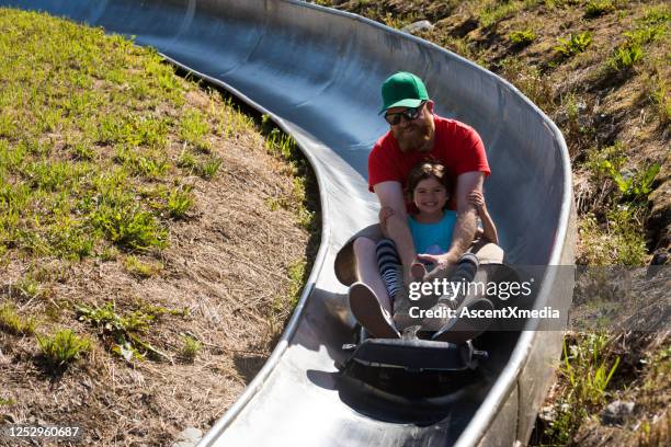 family bonding on summer vacation - luge stock pictures, royalty-free photos & images