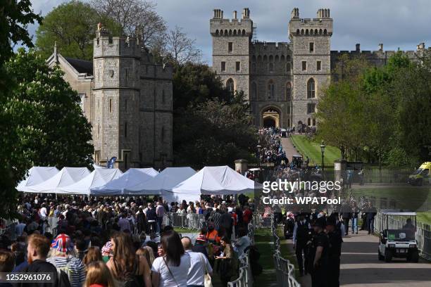 Members of the public queue as they arrive to take their seats inside Windsor Castle grounds ahead of the Coronation Concert to celebrate the...