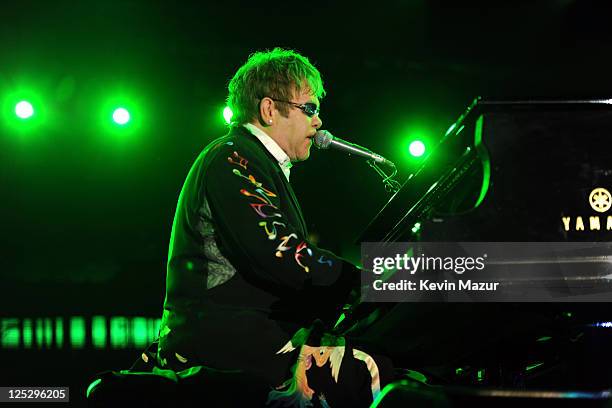 Musician Elton John performs on stage during the Andre Agassi Foundation for Education's 15th Grand Slam for Children benefit concert at the Wynn Las...