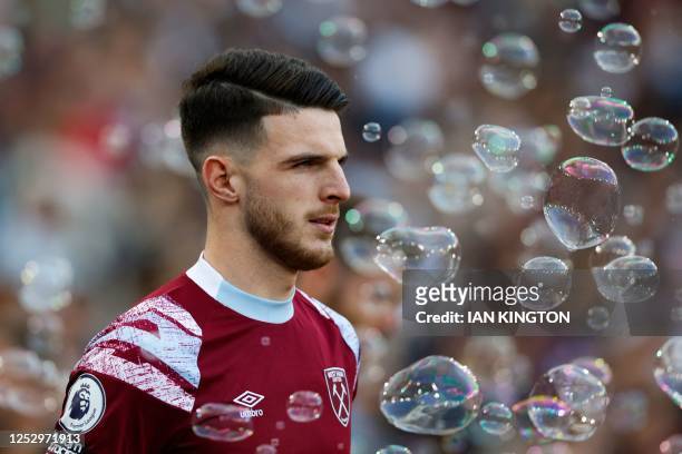 West Ham United's English midfielder Declan Rice looks on during the English Premier League football match between West Ham United and Manchester...