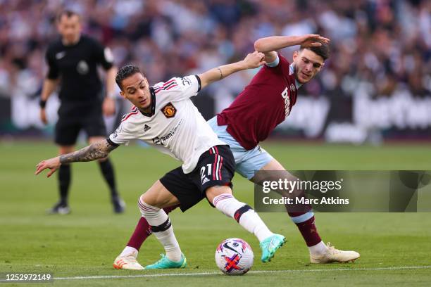 Antony of Manchester United in action with Declan Rice of West Ham during the Premier League match between West Ham United and Manchester United at...