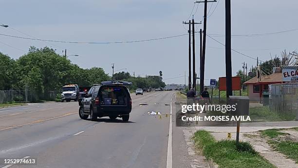 Police work at the scene after a driver crashed into several people in Brownsville, Texas, on May 7, 2023. - Seven people died and as many as six...