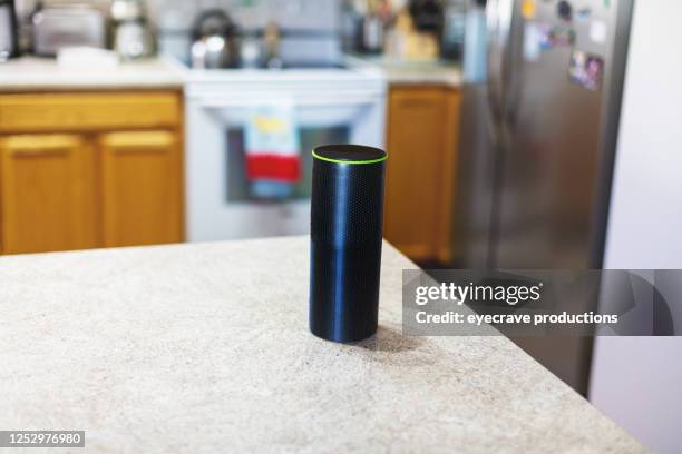 wireless ai technology in domestic residence kitchen - cylinder stock pictures, royalty-free photos & images