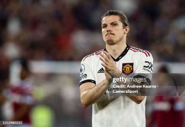 Manchester United's Marcel Sabitzer applauds his side's travelling supporters at the end of the match during the Premier League match between West...