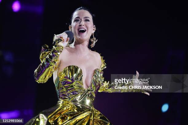 Artist Katy Perry performs inside Windsor Castle grounds at the Coronation Concert, in Windsor, west of London on May 7, 2023. - For the first time...