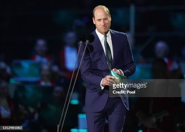 Prince William, Prince of Wales speaks on stage during the Coronation Concert in the grounds of Windsor Castle on May 7, 2023 in Windsor, England....