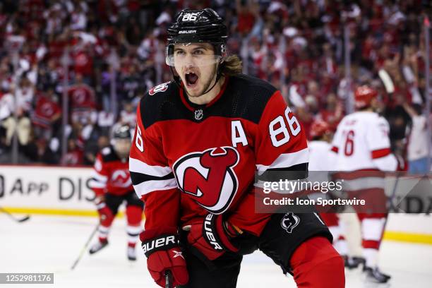 New Jersey Devils center Jack Hughes celebrates after scoring a goal during Game 3 of an Eastern Conference Second Round playoff game between the...