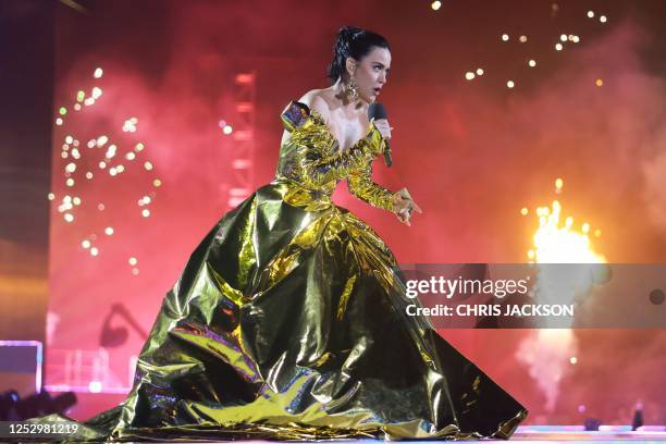 Artist Katy Perry performs inside Windsor Castle grounds at the Coronation Concert, in Windsor, west of London on May 7, 2023. - For the first time...