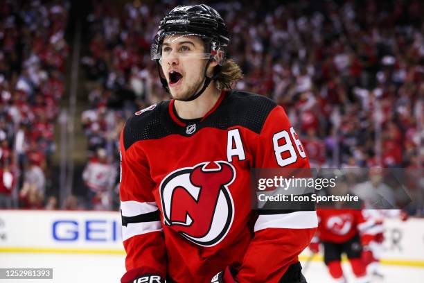 New Jersey Devils center Jack Hughes celebrates after scoring a goal during Game 3 of an Eastern Conference Second Round playoff game between the...