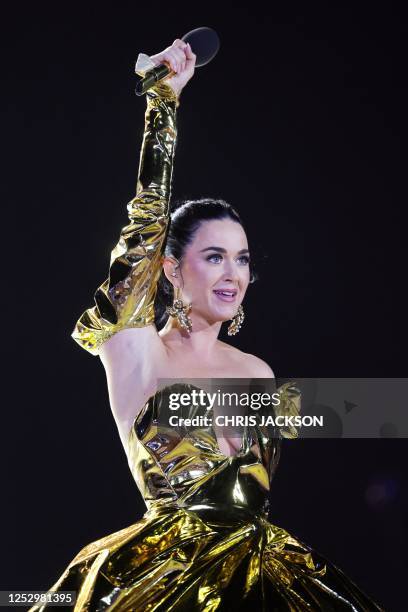 Artist Katy Perry performs inside Windsor Castle grounds at the Coronation Concert, in Windsor, west of London on May 7, 2023. - For the first time...