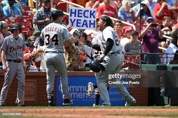 Jake Rogers is congratulated by Miguel Cabrera of the Detroit Tigers after hitting a grand slam against the St. Louis Cardinals in the sixth inning...
