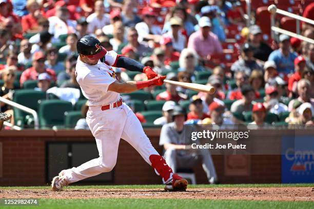 Andrew Knizner of the St. Louis Cardinals hits an RBI double against the Detroit Tigers in the sixth inning at Busch Stadium on May 7, 2023 in St...