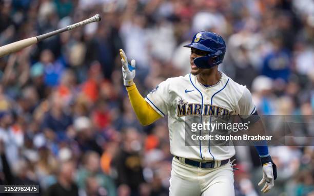 Julio Rodriguez of the Seattle Mariners flips his bat after hitting a solo home run off starting pitcher Brandon Bielak of the Houston Astros during...