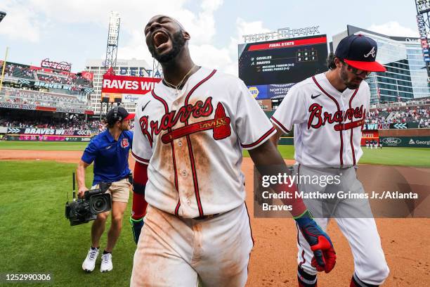 Michael Harris II of the Atlanta Braves celebrates after hitting a walk-off double during the twelfth inning against the Baltimore Orioles at Truist...