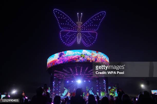 Drones form the shape of a butterfly during a performance at the Coronation Concert in the grounds of Windsor Castle on May 7, 2023 in Windsor,...