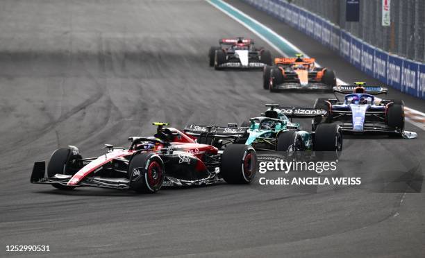 Alfa Romeo's Chinese driver Zhou Guanyu races during the 2023 Miami Formula One Grand Prix at the Miami International Autodrome in Miami Gardens,...