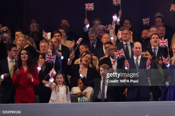 Catherine, Princess of Wales, Princess Charlotte, Prince George, and Prince William, Prince of Wales, in the Royal Box at the Coronation Concert in...