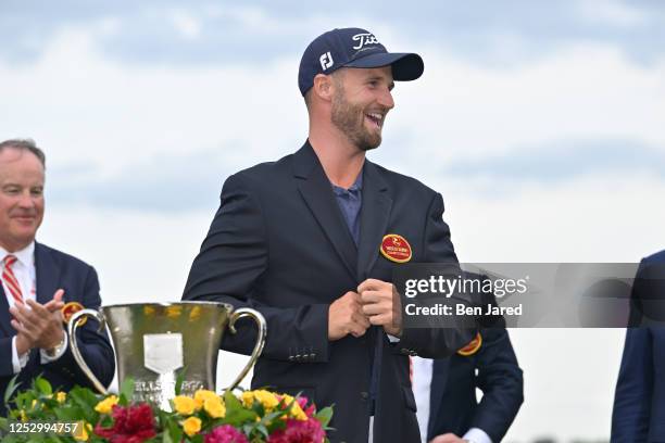 Wyndham Clark put on the jacket on the 18th green after the final round of the Wells Fargo Championship at Quail Hollow Club on May 7, 2023 in...